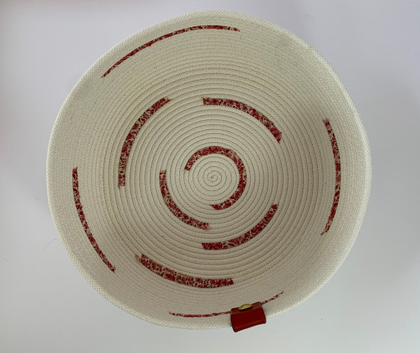 Fabric-wrapped braided cord bowl.