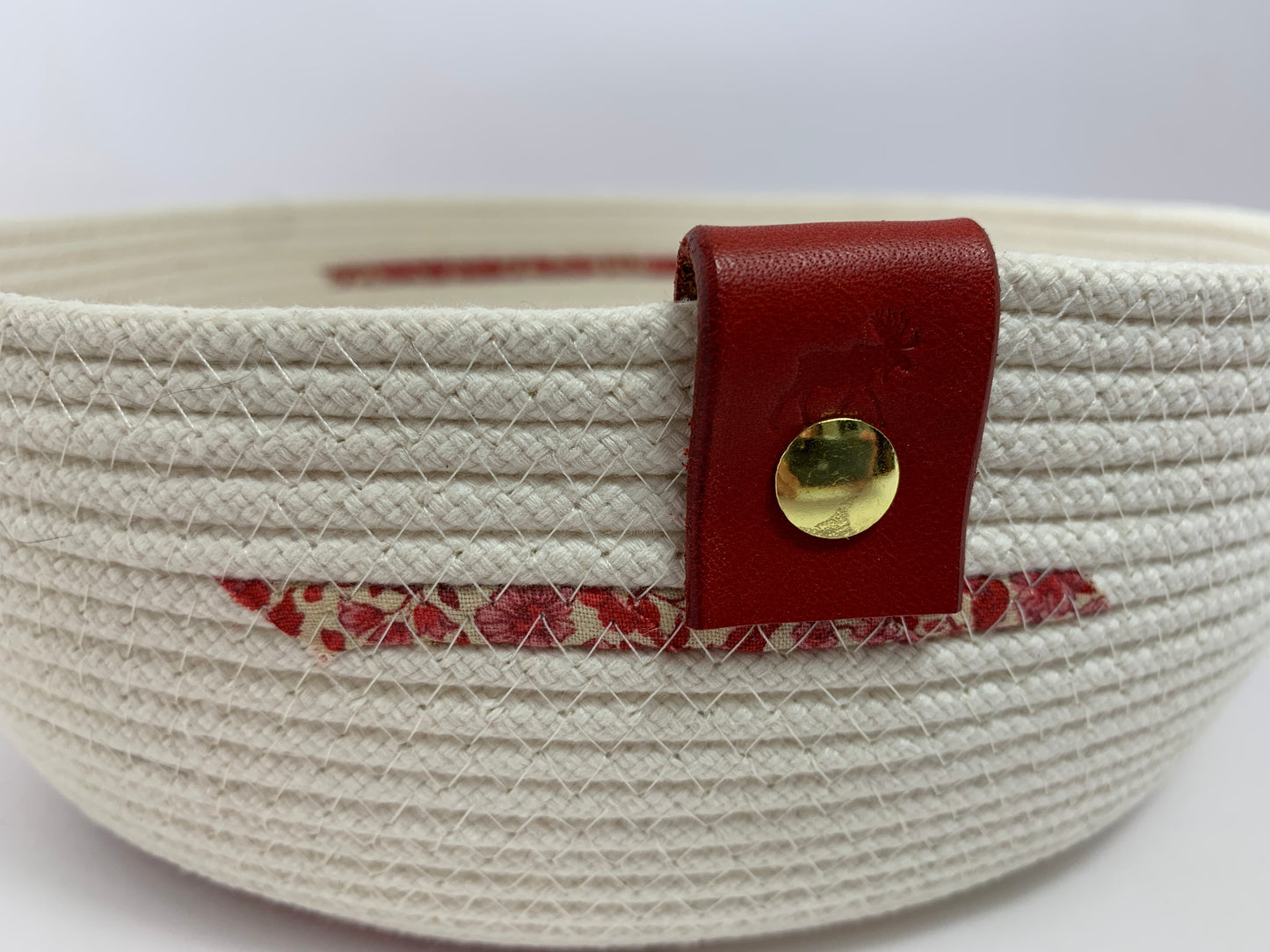 Fabric-wrapped braided cord bowl.